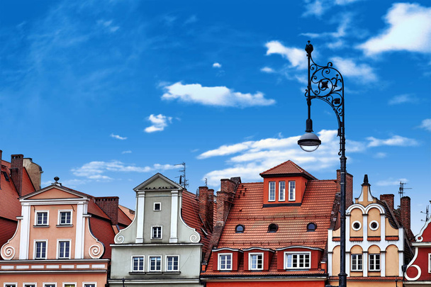 Central market square in Wroclaw Poland with old colourful houses, street lantern lamp. Travel vacation concept - 写真・画像