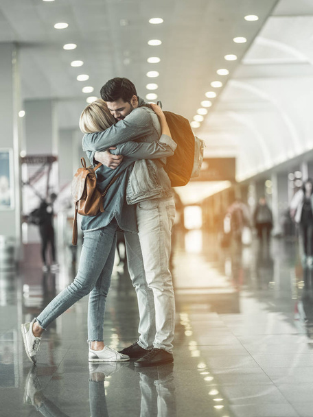 Outgoing man hugging cheerful female - Photo, image