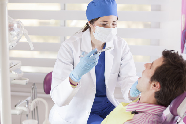 Working dentist - Foto, Imagen