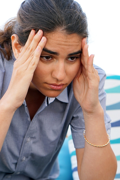 The girl's headache. Girl squeezes her head - Photo, Image