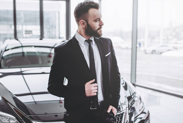 Businessman near car - Фото, изображение