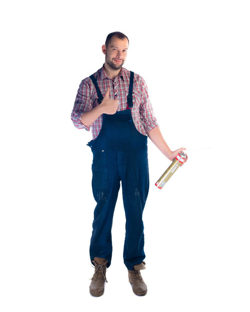 Portrét pohledný údržbář, stojící na bílém pozadí - Fotografie, Obrázek