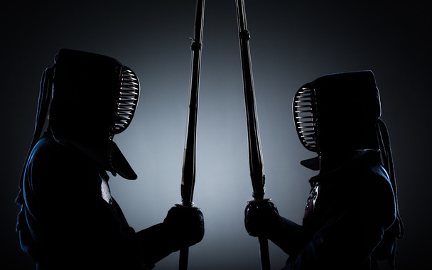 Two kendo fighters opposite each other - 写真・画像