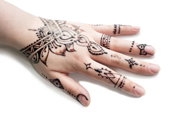 mehendi pattern on female hand on white background - Foto, Imagen