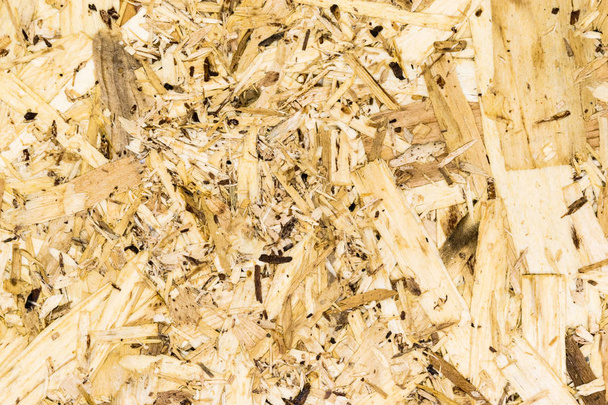 Close-up achtergrond oppervlak van geperst hout scheren plaat-spaanplaat - Foto, afbeelding