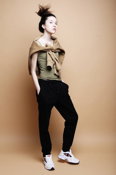 lifestyle and fashion concept: beautiful woman wearing casual clothes - 写真・画像