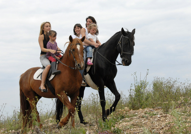 Cavalgando família
 - Foto, Imagem