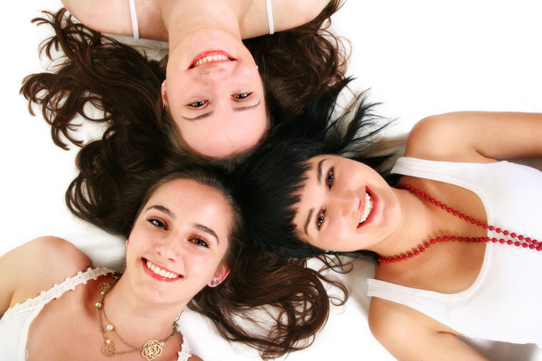 Three beautiful girls on the floor - Foto, imagen