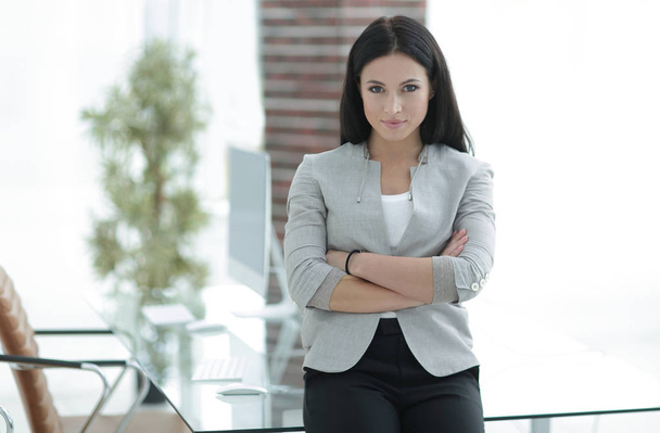 modern business woman on a blurred background. - Zdjęcie, obraz