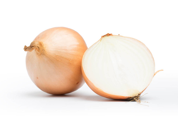 ripe onion on a white background - Фото, изображение