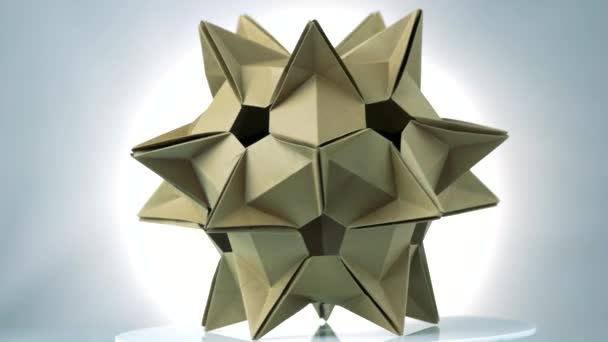 Stekelige origami model van bruine kleur. - Video
