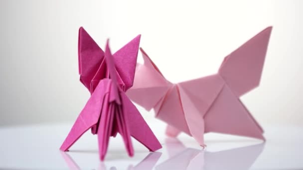 Two paper colorful foxes. - Footage, Video