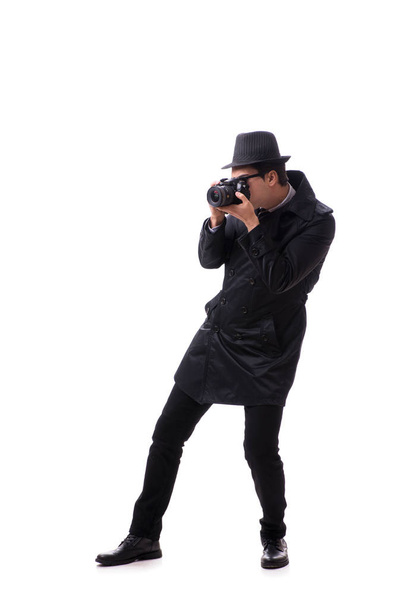 Espía con cámara tomando fotos aisladas en blanco - Foto, Imagen