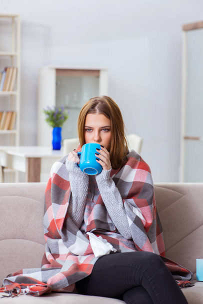 Sick woman suffering from flu at home - Fotó, kép