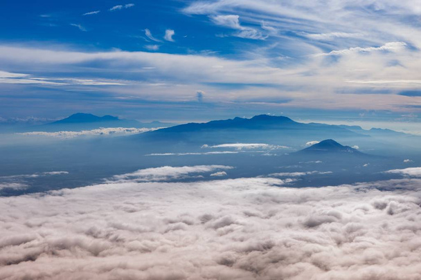 Argopuro and Raung volcanoes in East Java from mt Semeru summit Version 2 - Foto, imagen