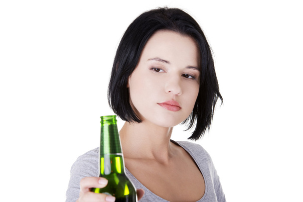 Teen girl taking beer - Foto, afbeelding