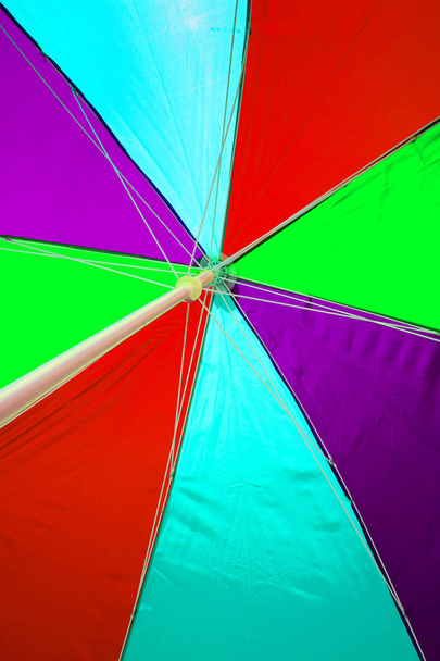Beach Umbrella undersurface colourful. Trip tropical beah holida - Fotó, kép