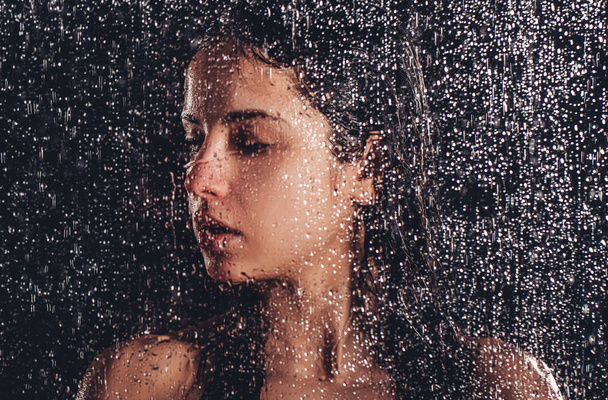 Woman in shower - Фото, изображение
