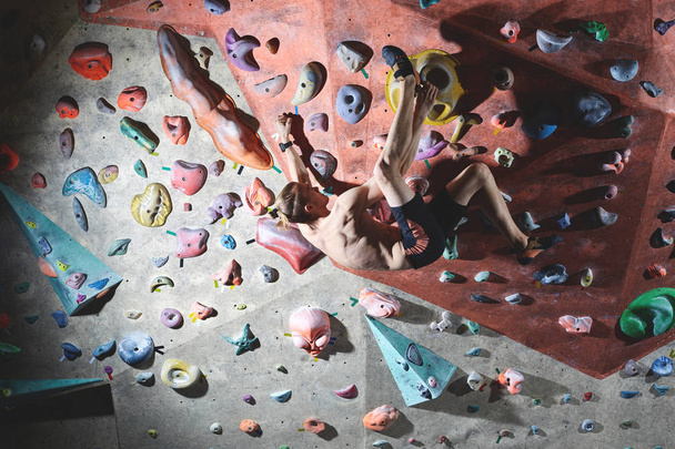 man climber climbs indoors - Fotoğraf, Görsel