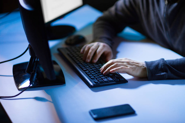 hacker hands typing on computer keyboard - Foto, imagen