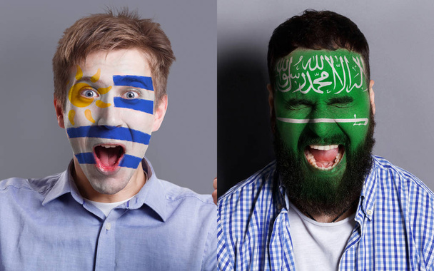 Aficionados emocionales al fútbol con banderas pintadas en las caras
 - Foto, Imagen