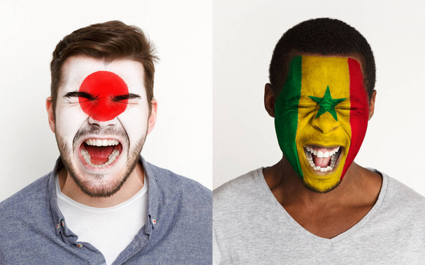 Aficionados emocionales al fútbol con banderas pintadas en las caras
 - Foto, imagen
