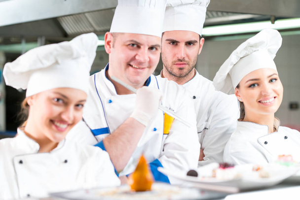 Chefs in the kitchen - Foto, afbeelding