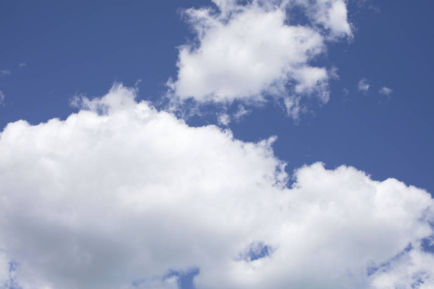 white clouds and blue sky in sunny day - Valokuva, kuva