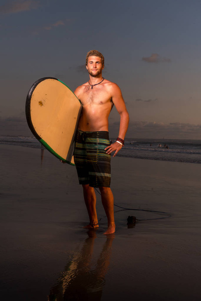 Surfer on the beach - 写真・画像