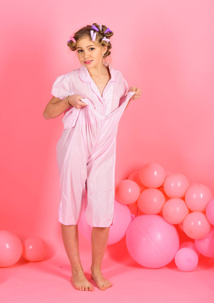 Full-length portrait of cute daughter posing on the pink background. little birthday girl. - Φωτογραφία, εικόνα