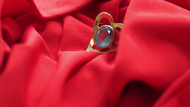 Diamond on heart shape ring on red satin - Footage, Video