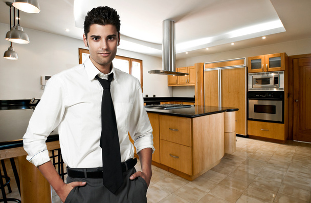 successful man at his new modern big kitchen - Photo, Image