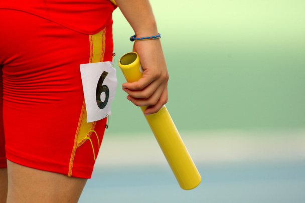 Athelete on a relay event - Photo, Image