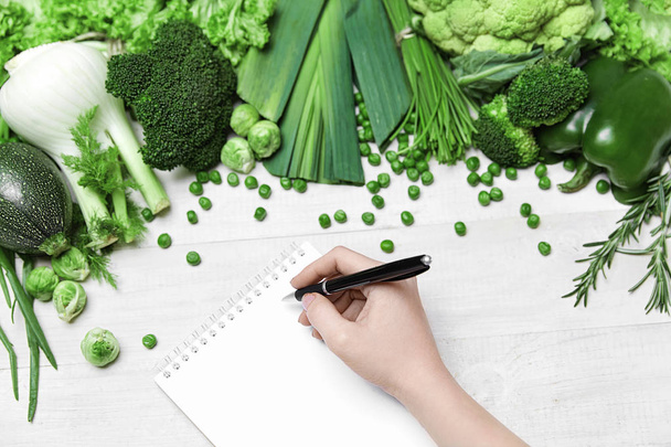Shopping List. Hand Writing In Notebook Near Vegetables - Foto, Imagem