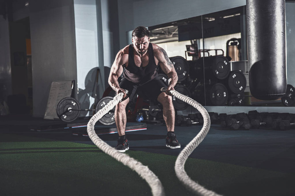 Men with rope in functional training fitness - Fotoğraf, Görsel