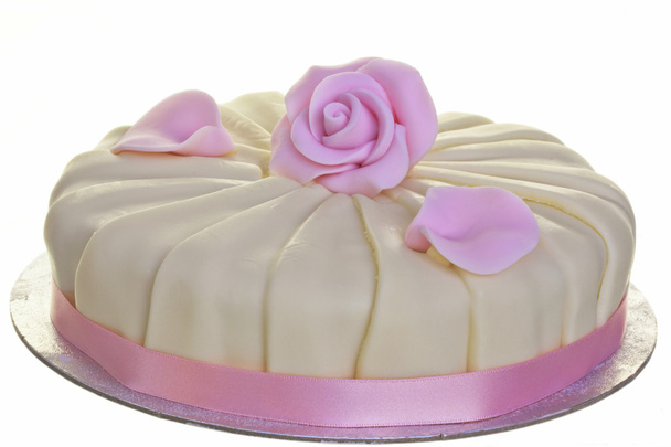 ピンクと白の丸いケーキ. - 写真・画像