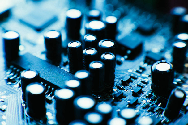 computer board capacitors blue color close-up - Foto, imagen