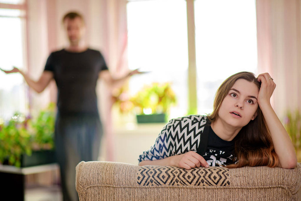 family quarrel between father and daughter of a teenager - Fotó, kép