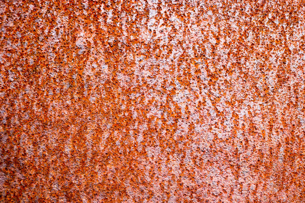 Texture of rusty brown old shabby oxidized metal, iron with bulges, pits and patterns, background. - Фото, зображення