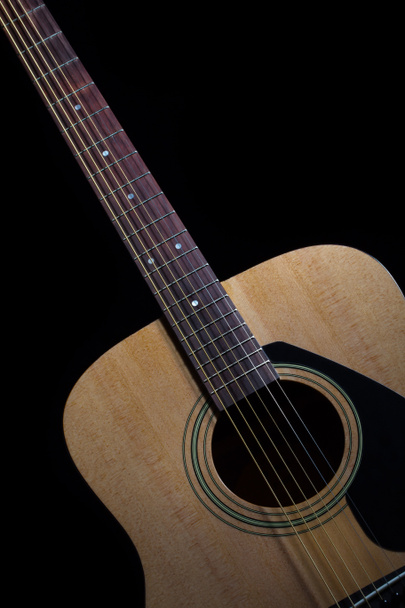 Guitar acoustic on black background - Фото, зображення