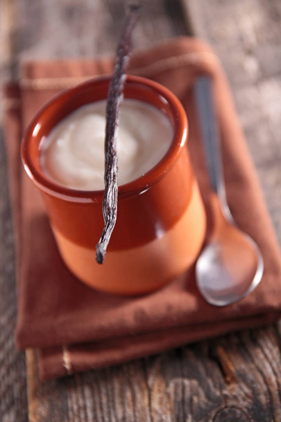 banilla yogurt in pot close-up view  - Photo, image