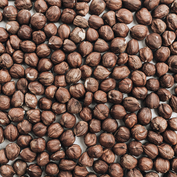 Raw hazelnut pattern. Flat lay, top view nutrition concept. - Foto, Bild