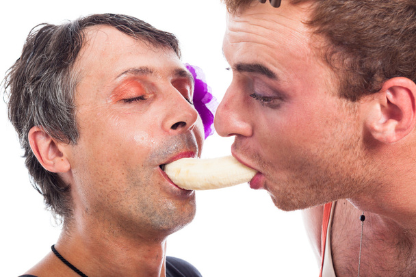 Смешные трансвеститы едят банан
 - Фото, изображение