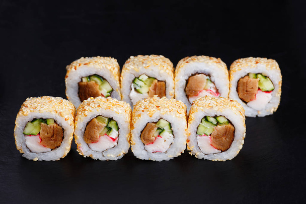 Japanese traditional seafood. Appetizing fresh sushi roll with o - Φωτογραφία, εικόνα
