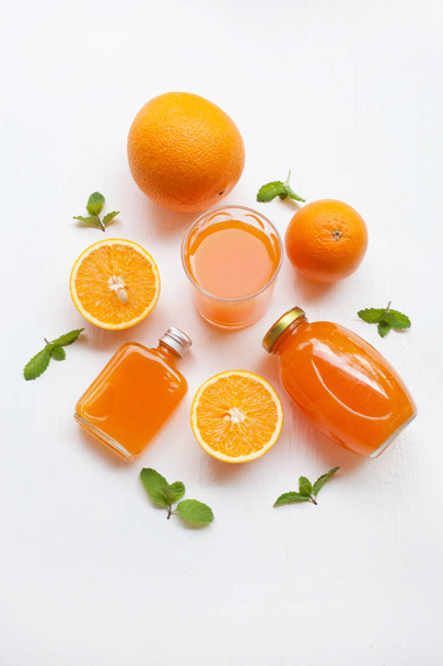 Fresh orange juice on white, Healthy vitamin drink. - Foto, imagen