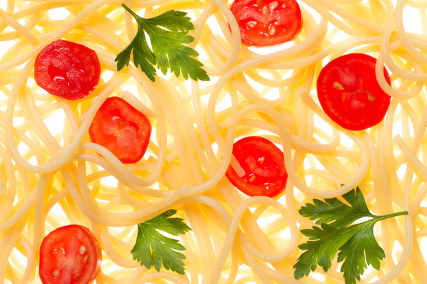 Spagetti ja ilmassa keitetty tomaatti, pastaa takakontissa
 - Valokuva, kuva