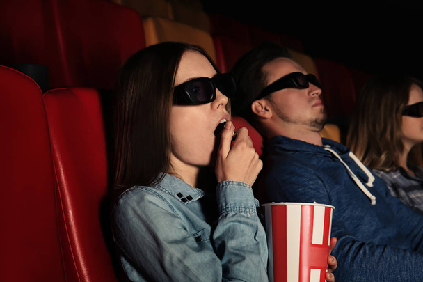 Young people watching movie in cinema - Foto, Imagen