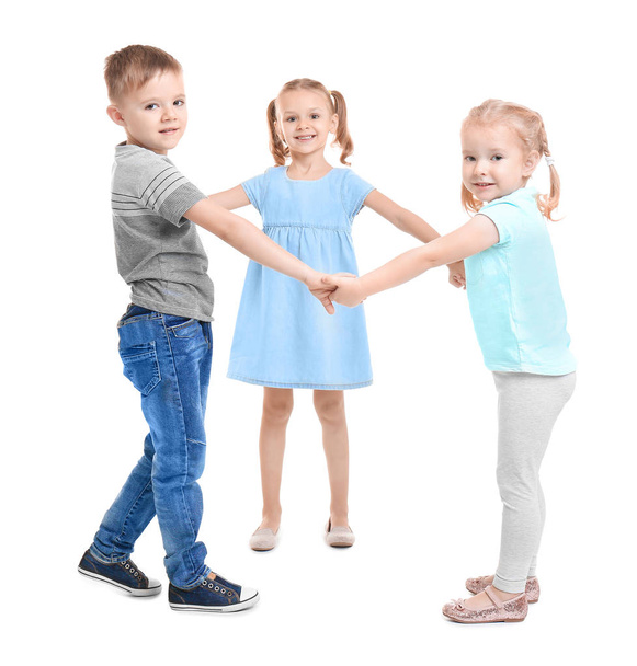 Cute little children playing on white background - Photo, image