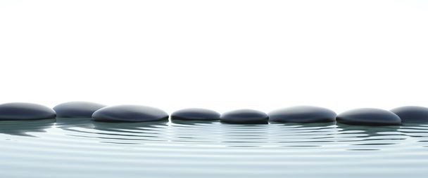 Zen stones in water on widescreen - Photo, Image