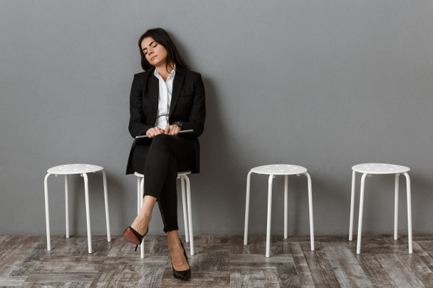Tired businesswoman - Фото, изображение